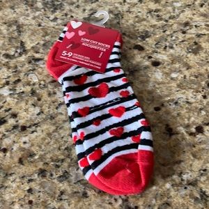 Women’s black stripe and heart socks new with tags